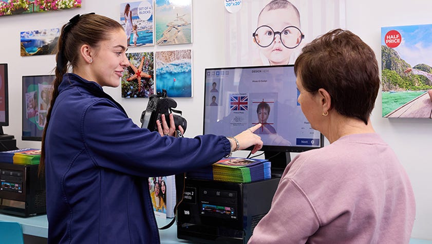 customer taking driving licence photos in-store