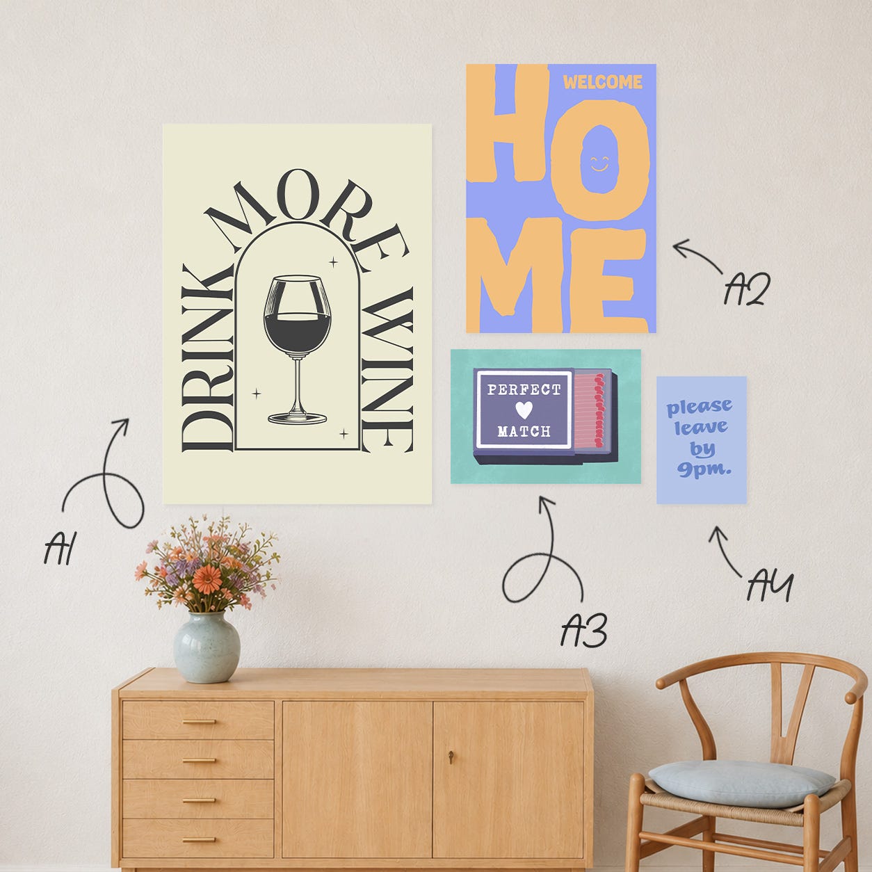 selection of poster art prints on a wall