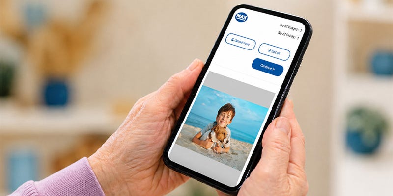 A mobile phone showing the Max Spielmann app.