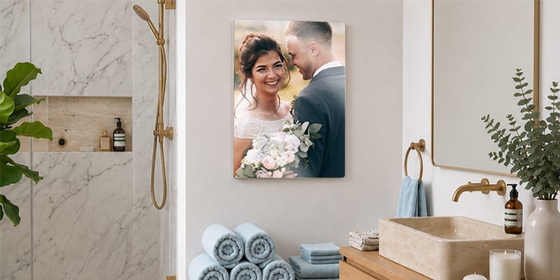 A bathroom wall art print displaying a happy couple on their wedding day.